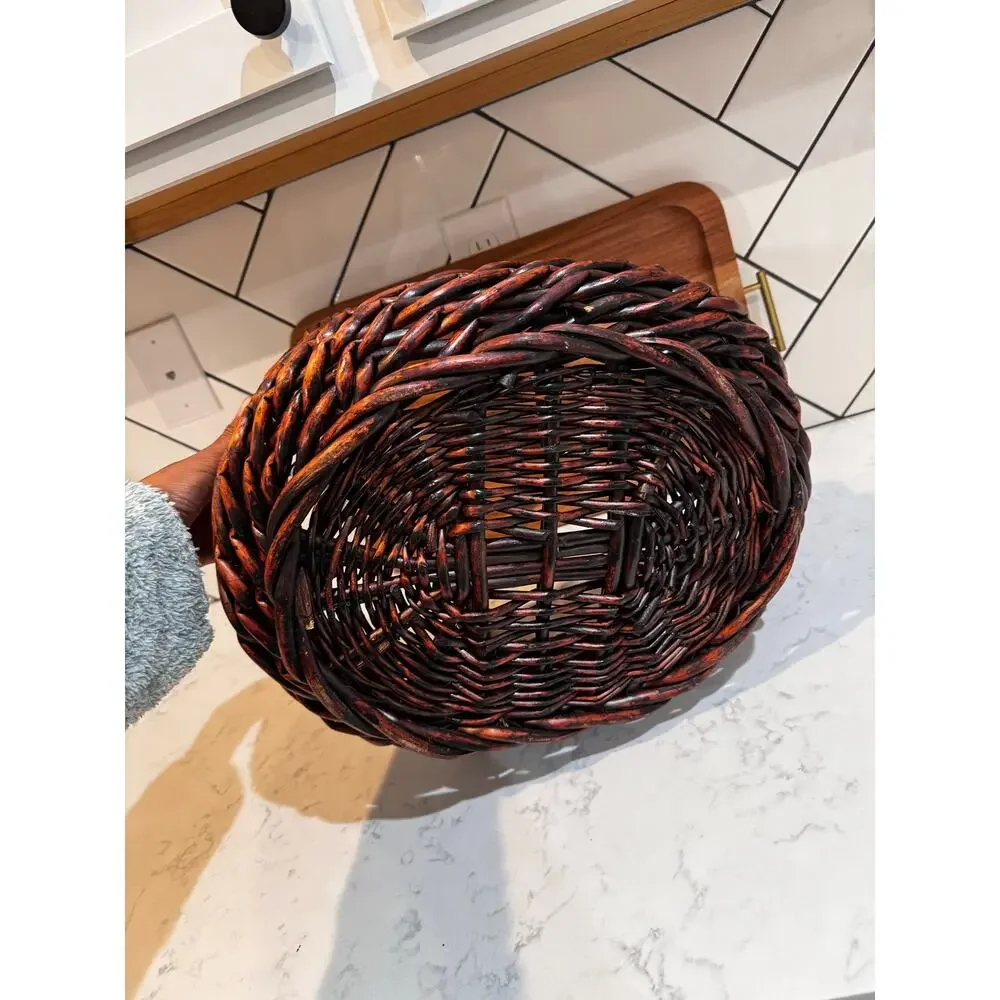 dark stained willow basket rustic handwoven texture sturdy center handle vintage